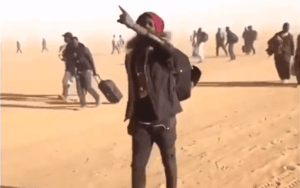 Africa youth-traveling-on-the-desert