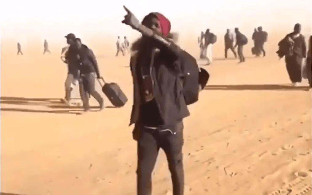 Africa youth-traveling-on-the-desert