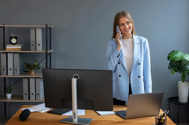 business person looking finance graphs 23 2150461320