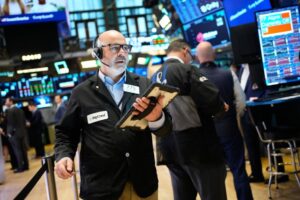 Wall Street ended the day mixed but with a bit of optimism in the air