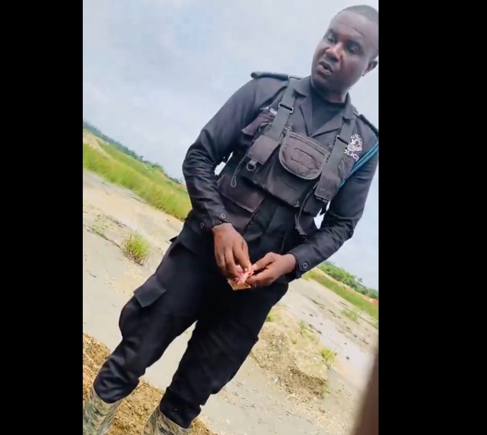 Caught on Camera Police Officer Allegedly Negotiates Half-Payment with Illegal Miners
