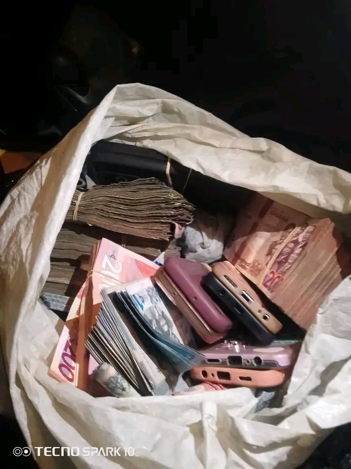 AK-47 rifle and GH¢140K are recovered by police during the Lashibi robbery