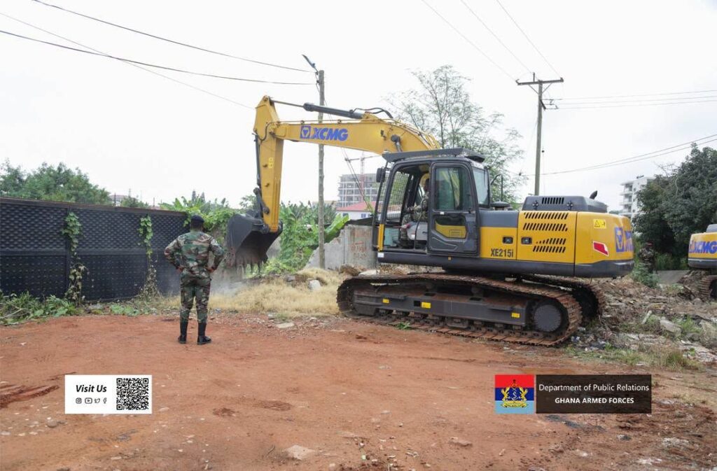 Unauthorized buildings along the banks of Tesa Dam and Legon Boundary Road are demolished by a post-flood mitigation task force